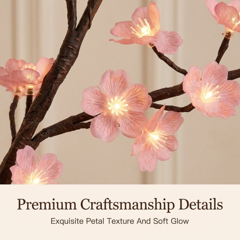 Cherry blossom branch lights on bedroom wall