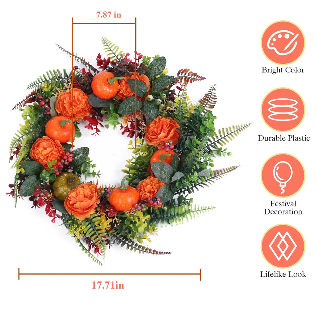 Autumn wreath with mini pumpkins and berries
