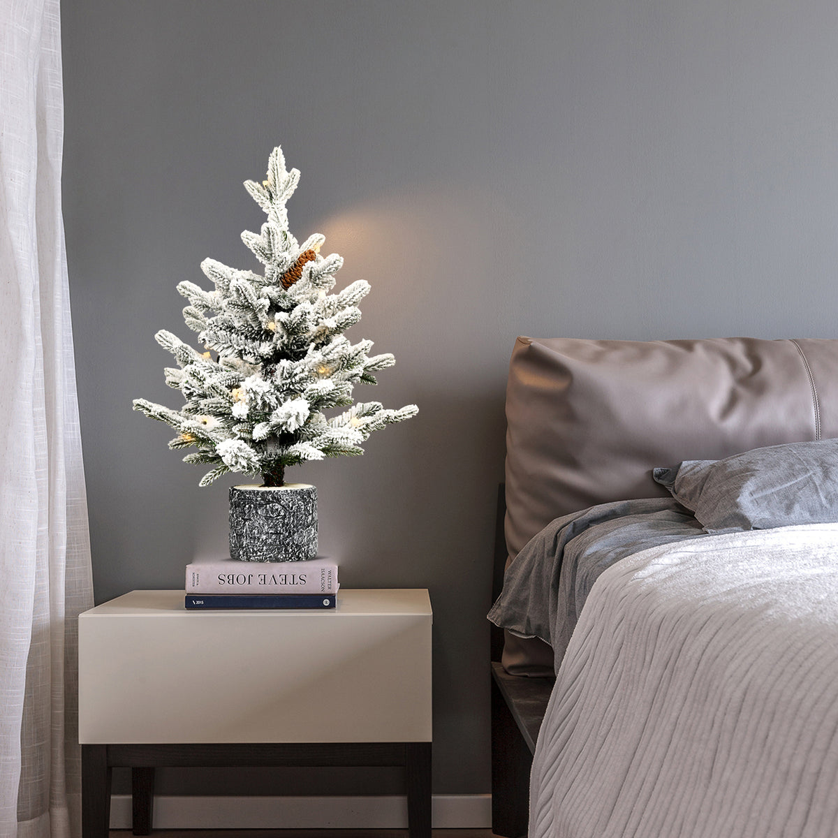 Snow-flocked mini Christmas tree, pre-lit 2 ft