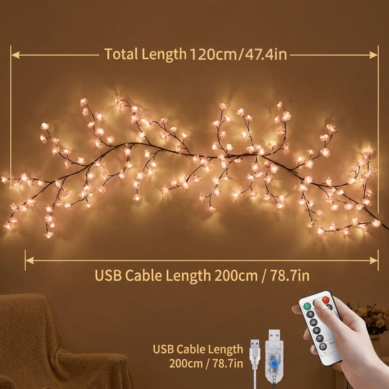 Cherry blossom branch lights on bedroom wall