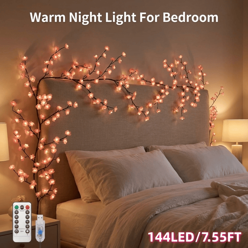 Cherry blossom branch lights on bedroom wall
