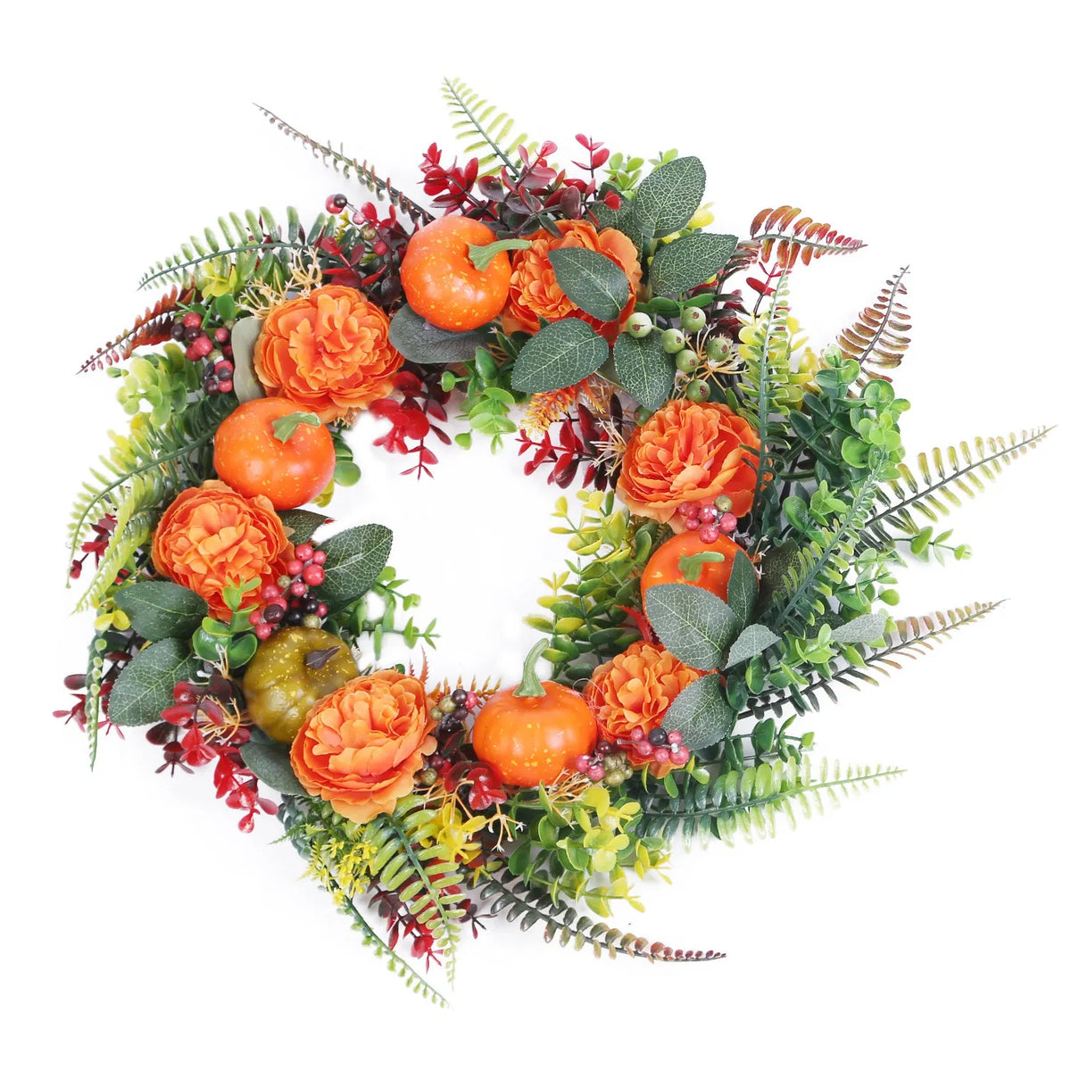 Autumn wreath with mini pumpkins and berries