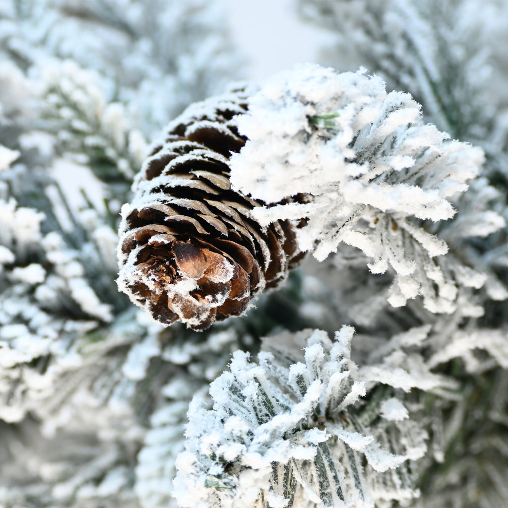 Snow-flocked mini Christmas tree, pre-lit 2 ft