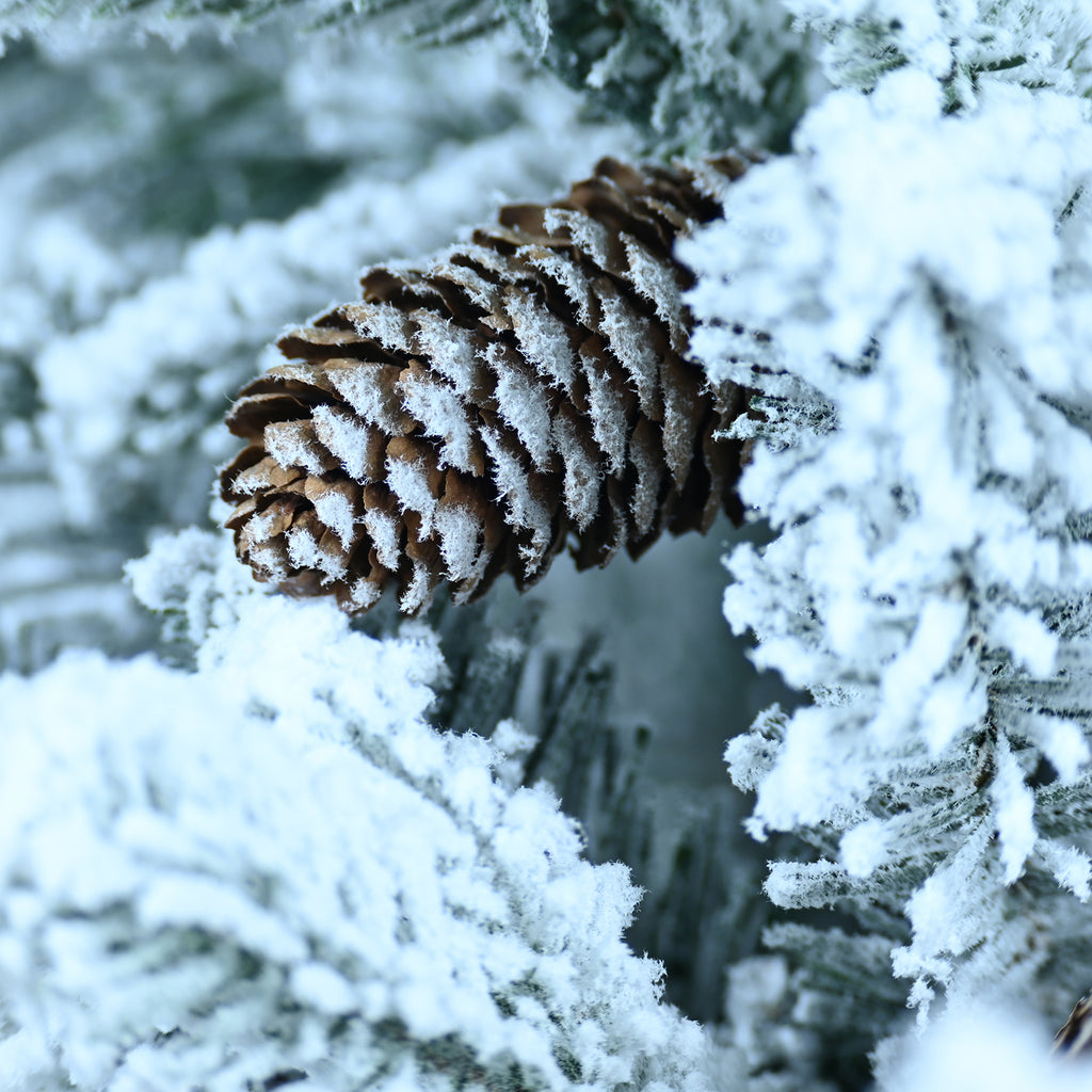 Snow-flocked mini Christmas tree, pre-lit 2 ft
